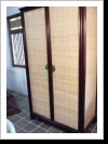 Minimalistic Armoire in Mahagoni with Rattan.