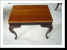 Made in Mahagoni with carved legs
